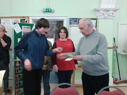 Cameron receiving a certificate from Gordon Nicolson at PACT Stone Soup 2014