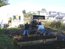 Appleby Edibles planters with topsoil donated by Story Homes in Appleby